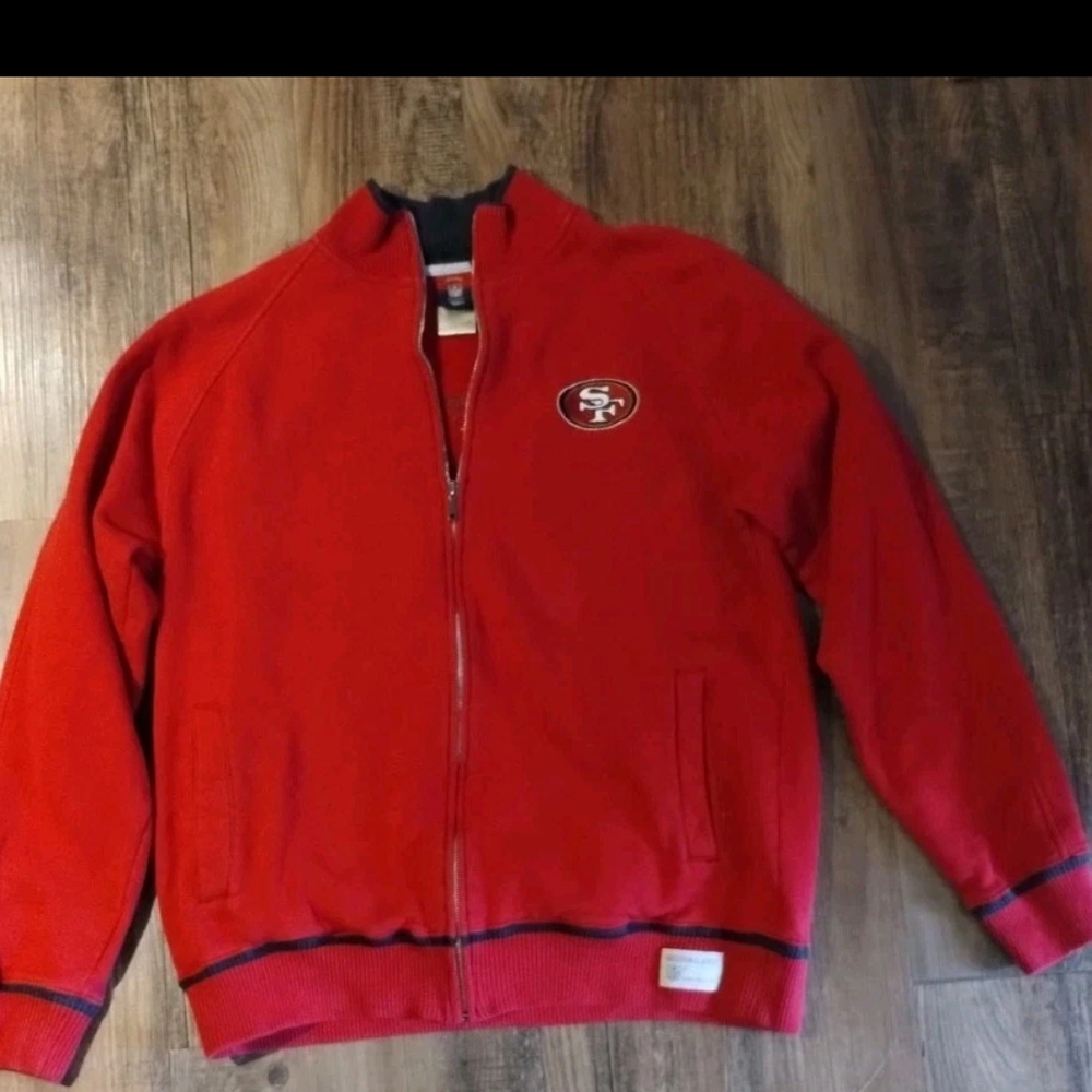 Reebok Red Bomber Jacket with Ribbed Cuffs. (Has Small Hole)